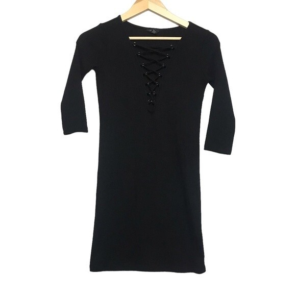 Forever 21 Dresses & Skirts - Black tight‎ dress with front cross design size small
